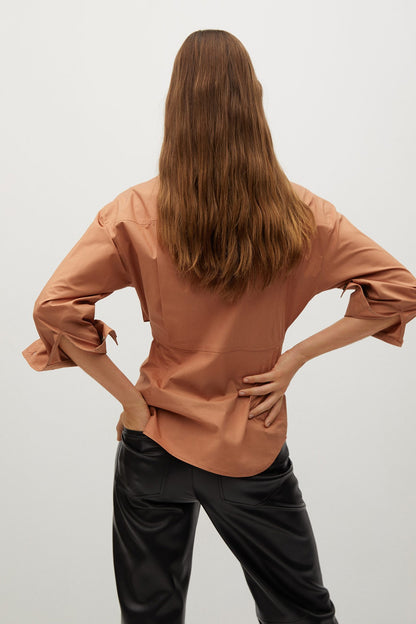 Peach button-up shirt, back view with waist tie