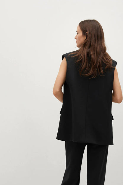 Black sleeveless vest with side pockets and open back, relaxed fit