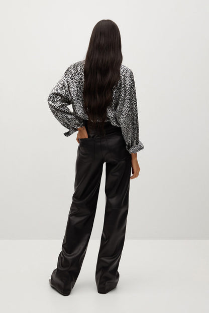 MANGO ecru-and-black patterned blouse back view with long sleeves and cuff