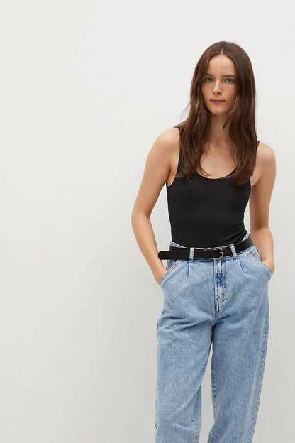 Black sleeveless scoop-neck tank top, straight hem, worn with jeans