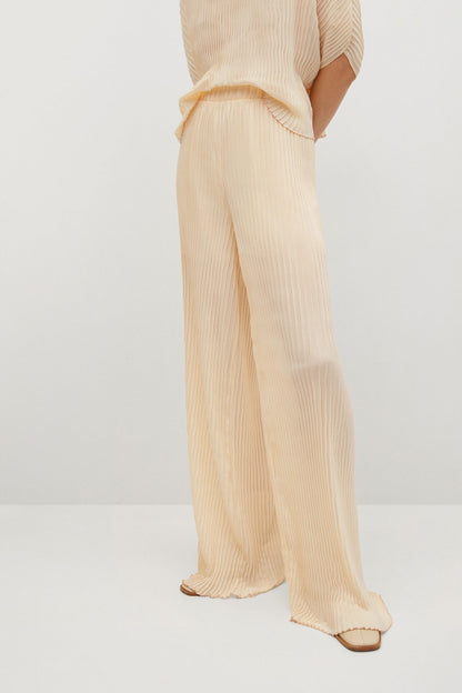 Off-white striped wide-leg pants with elastic waistband, ankle length, side view