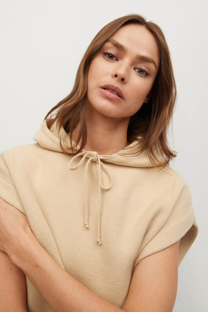 Sand sleeveless hoodie close-up with drawstring hood and tie cords