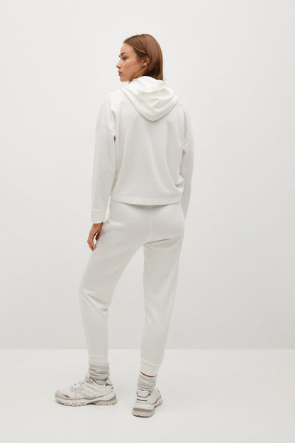 Off-white pullover hoodie with hood paired with matching jogger pants