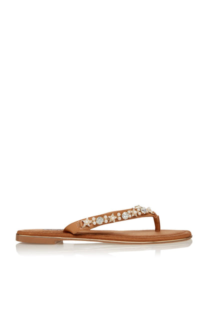 Tan thong sandals with rhinestone and pearl embellished strap