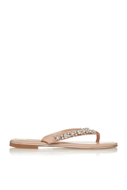 Nude thong sandals with rhinestone V-strap and flat leather sole