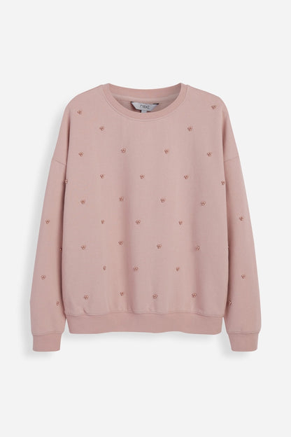 Pink crewneck sweatshirt with small allover bow print