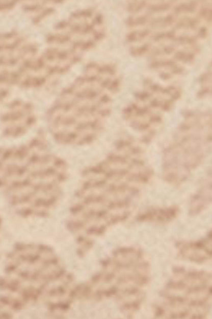 Light beige lace fabric close-up with floral pattern
