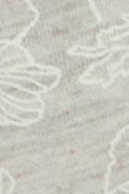 White lace fabric texture with floral pattern