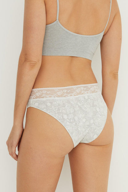 Medium grey bralette with lace-trim briefs and scalloped waist band