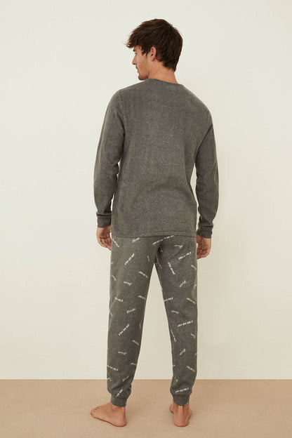 Men's dark gray pajama set back view: long-sleeve top and patterned jogger pants
