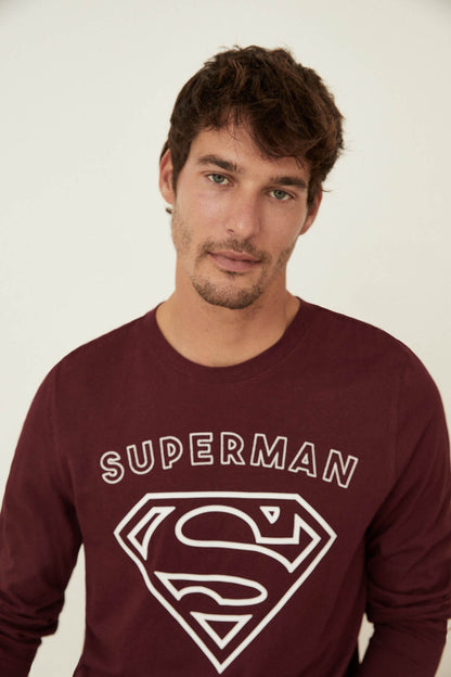 Men's maroon pajama top with Superman logo graphic across the chest