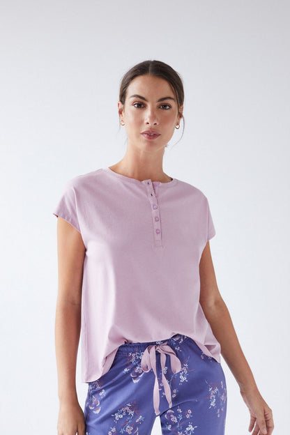 Women'secret lilac pajama top with henley buttons and blue floral tied pants, front