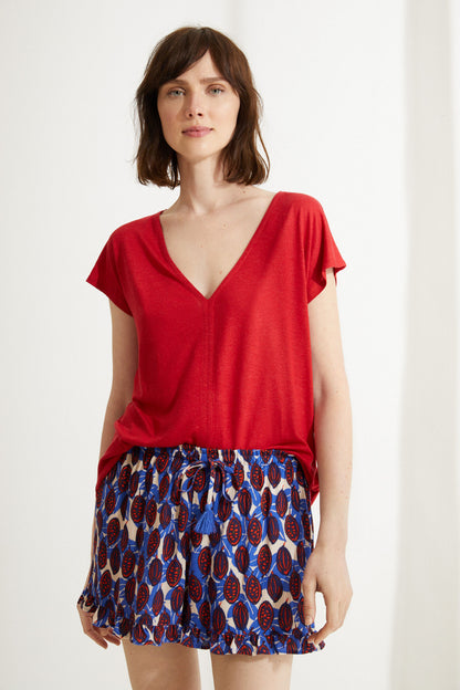 Women'secret red V-neck short-sleeve top with blue patterned mini skirt