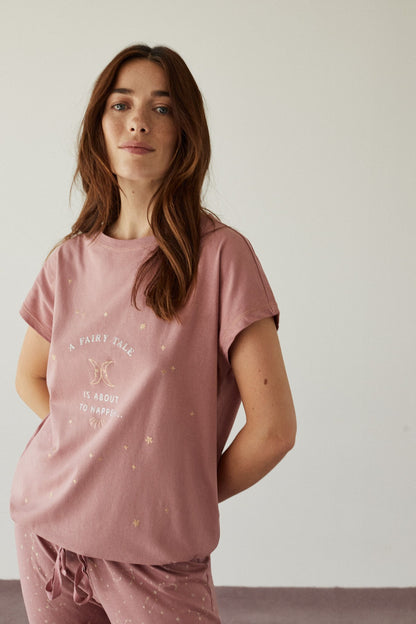 Women's pink pajama set: short-sleeve tee with star graphic, matching drawstring pants