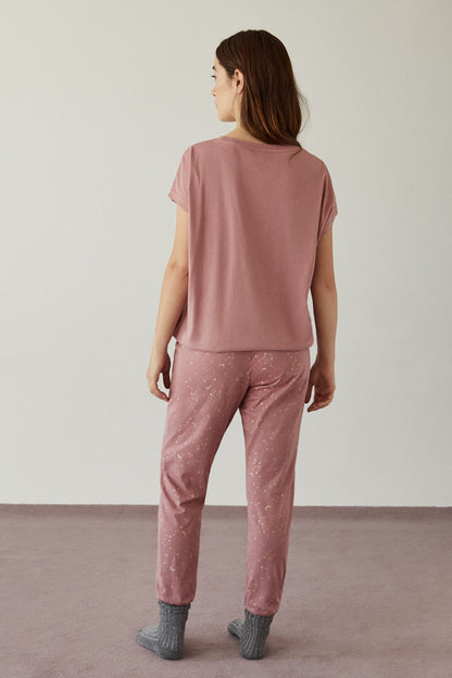 Women's pink pajama set: short-sleeve top and full-length drawstring pants, back view