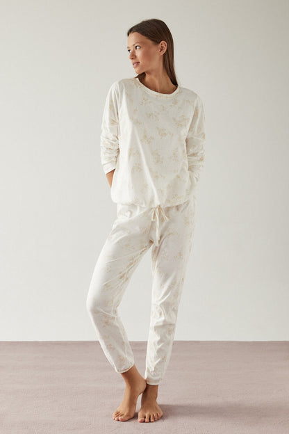 Women's Secret white pajama set with brown print, long-sleeve top and pants