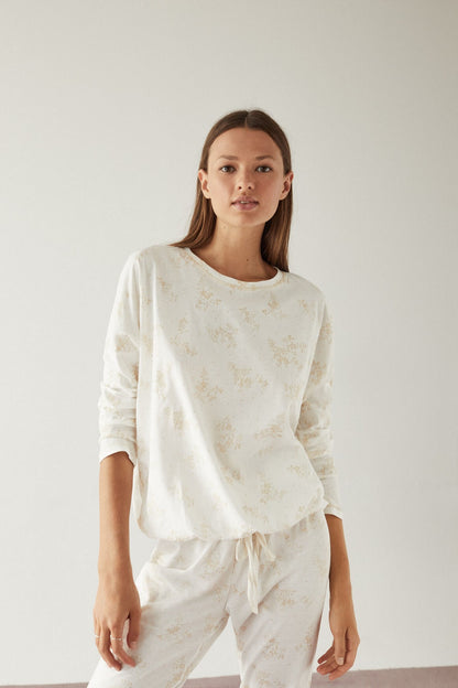 Women's Secret white pajama set with brown print, relaxed long-sleeve top and pants