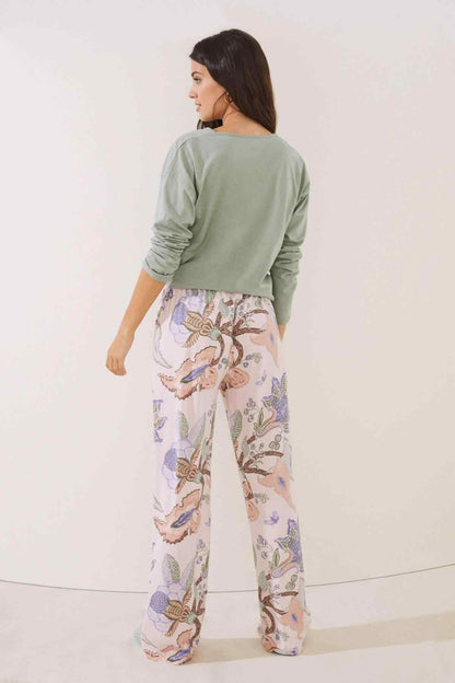 Light pink printed pajama pants, back view, elastic smocked waistband and wide legs