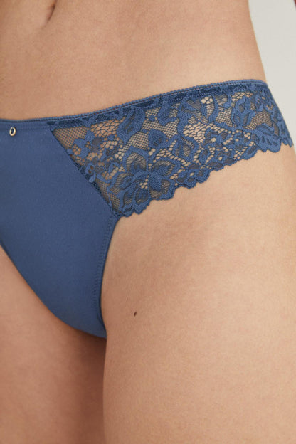 Medium blue lace-trim bikini briefs with sheer mesh panel