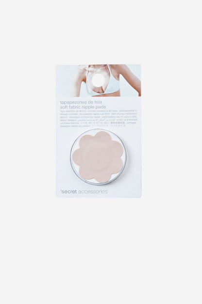Skin-tone soft adhesive nipple pads on package