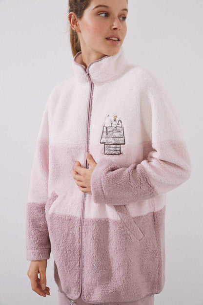 Women's fleece zip-up pajama jacket in white and mauve pink, chest graphic print.