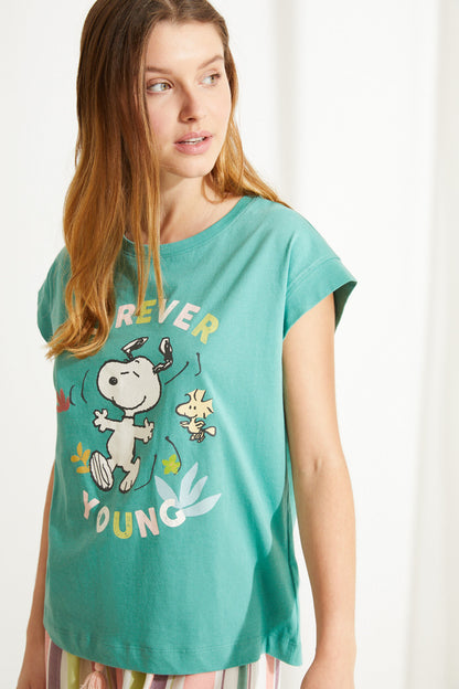 Women'secret teal green T-shirt with character graphic and 'YOUNG' text