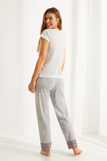 Women'secret pajama set with short-sleeve top and dark patterned lounge pants