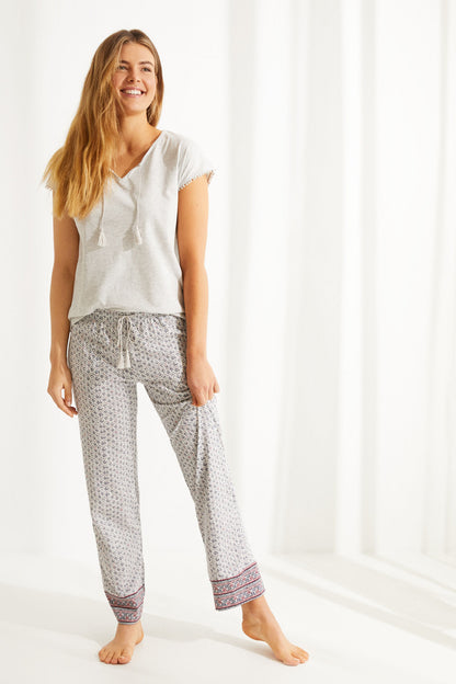 Women'secret pajama set: short-sleeve top and dark patterned pants