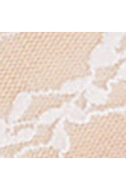 Close-up of white lace fabric with scalloped trim