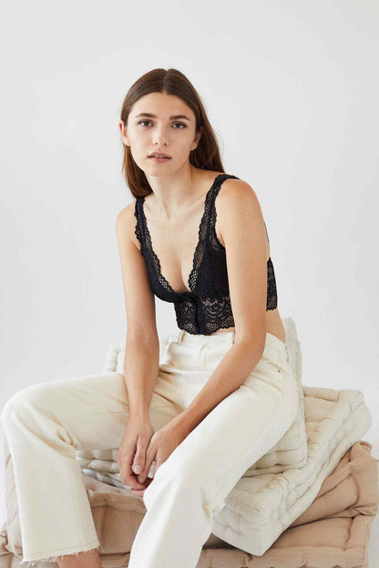 Black lace bralette with plunging V-front and scalloped straps