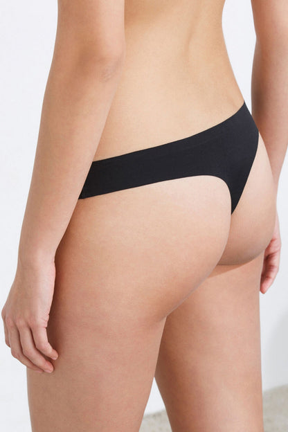 Women'secret black bikini brief, side view with moderate coverage