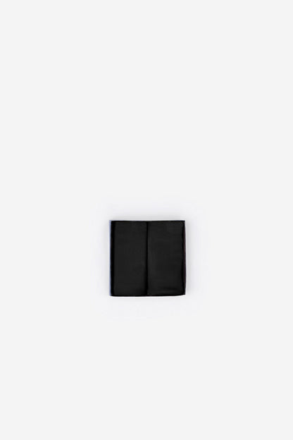 Folded black high-waist briefs, two-panel view
