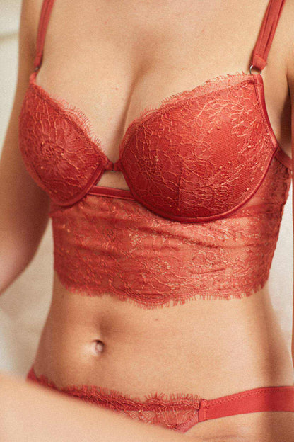 Red lace bra and briefs set with textured cups and elastic waist band