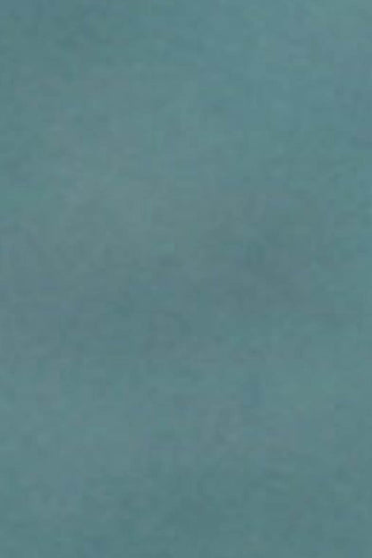 Teal fabric surface close-up