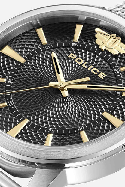 Close-up of black textured dial with gold-tone hands and POLICE markers