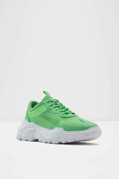 Green lace-up sneaker with chunky tread sole, three-quarter view