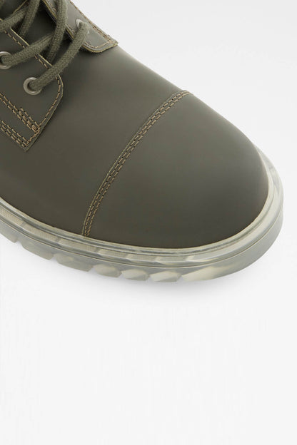 Olive leather lace-up boot toe cap and stitched welt with rubber sole