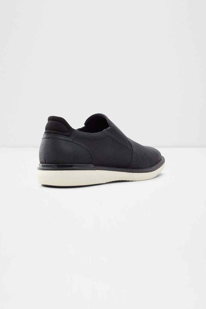 ALDO black leather slip-on shoes from heel view with white rubber sole