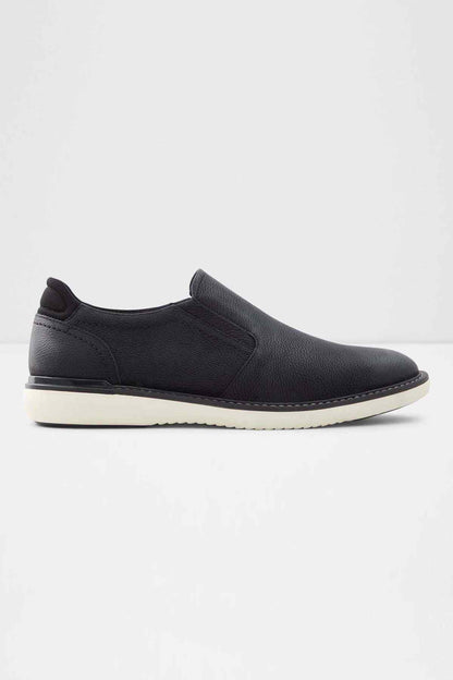 ALDO black leather slip-on shoes, low profile with white rubber sole
