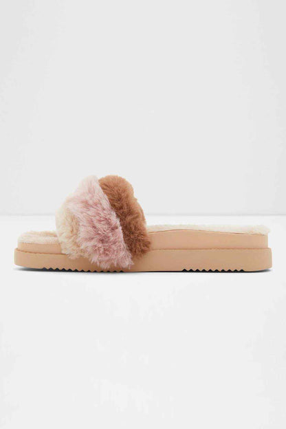 Natural faux-fur slide sandals, side view with layered pink and tan fur