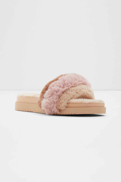 Natural faux-fur slide sandals, front view with plush pink strap over tan footbed