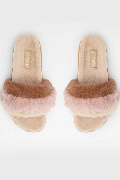 Pair of Natural faux-fur slide sandals with tan interior and pink cushioned strap