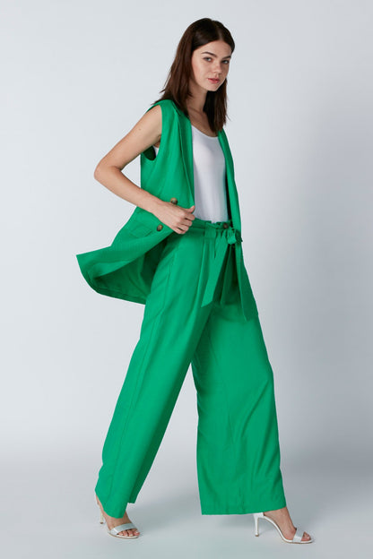 Green sleeveless jumpsuit with wide-leg pants and tie waist