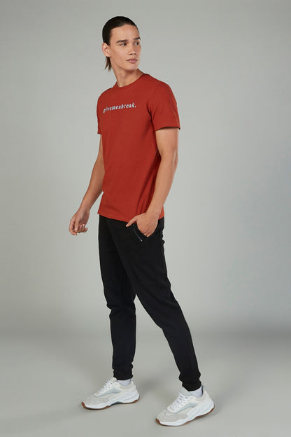 Black jogger pants with drawstring waist and cuffed ankle