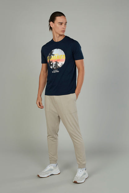 Stone drawstring jogger pants with side pockets and cuffed ankle hems