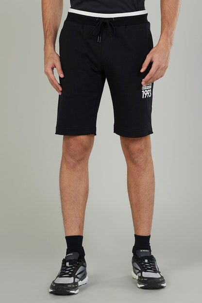 Splash black drawstring athletic shorts with white waistband stripe, side print '1993'