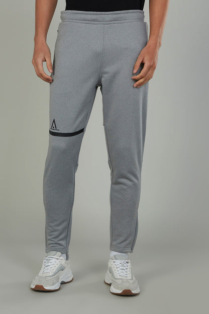 Men's grey sweatpants with elastic waistband and logo knee patch