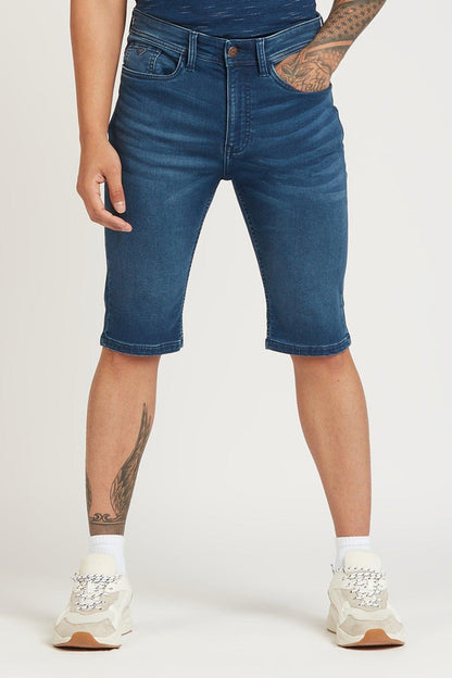 Blue denim shorts with straight cut, front button, and zip fly