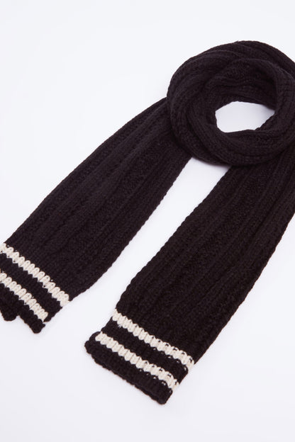 Black ribbed knit scarf with two white stripe bands on ends