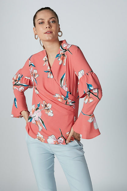 Pink floral V-neck blouse with flared ruffle sleeves